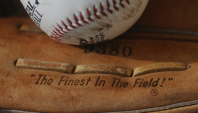 Close-up of a baseball mitt and ball
