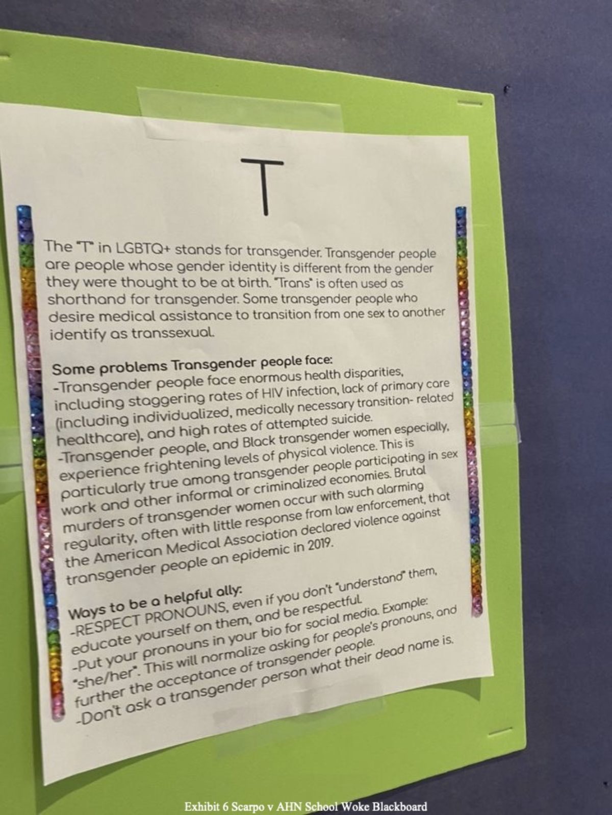 “T” poster on display at the Academy of the Holy Names. Courtesy of Adam Levine from the lawsuit exhibits.