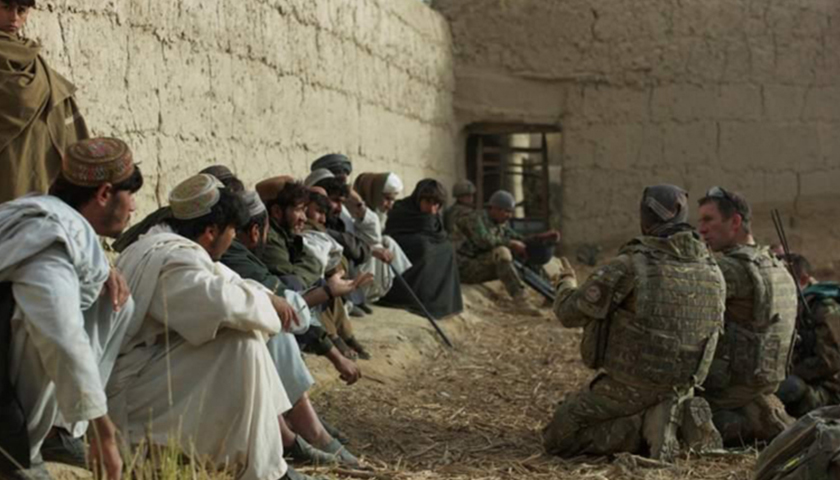 Afghan, coalition forces advance into Taliban heartland British Lt. Col. Andrew Harrison, 2nd Battalion, The Parachute Regiment commander, conducts a shura with Tor Ghai village elders after ISAF and ANA secured the village during a recent operation. (Photo courtesy of Task Force Helmand Public Affairs)