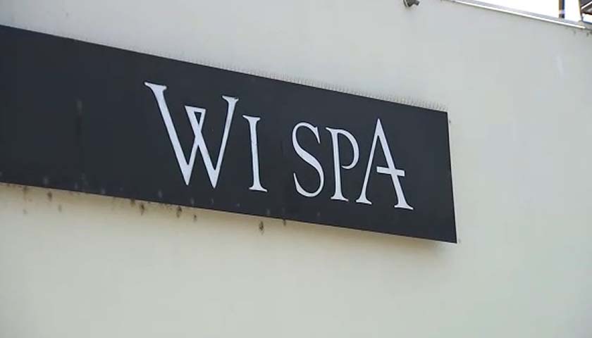 Close up of Wi Spa sign on building