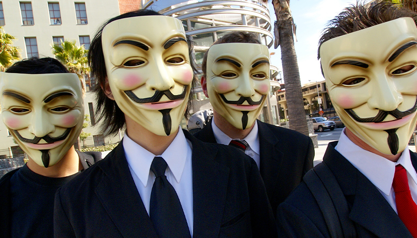 group of people wearing masks