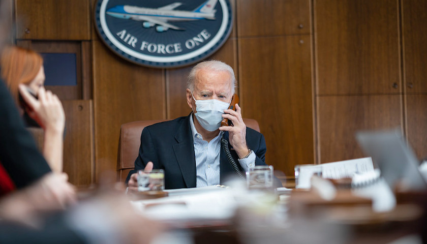 Masked Joe Biden on Cell Phone