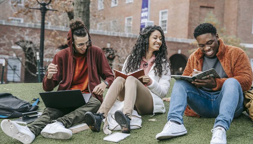 college students study outdoors