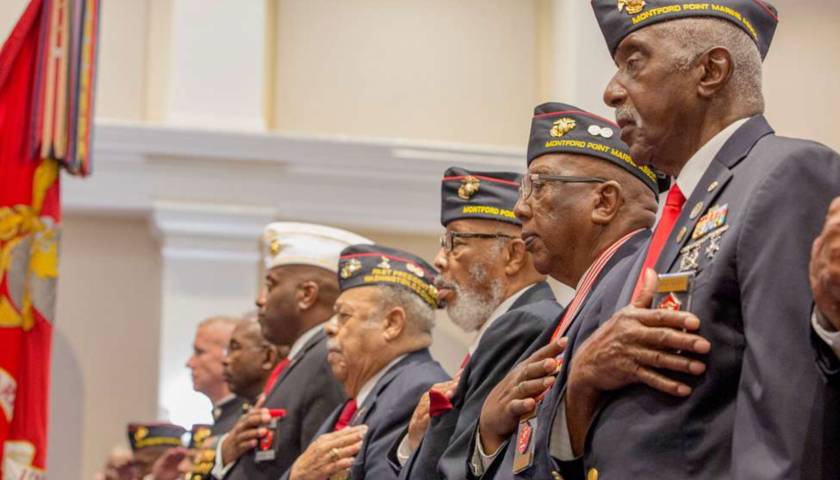 riginal Montford Point Marines stand for the National Anthem